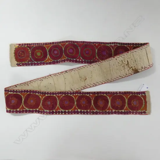 A band of Uzbekistani suzani fabric.